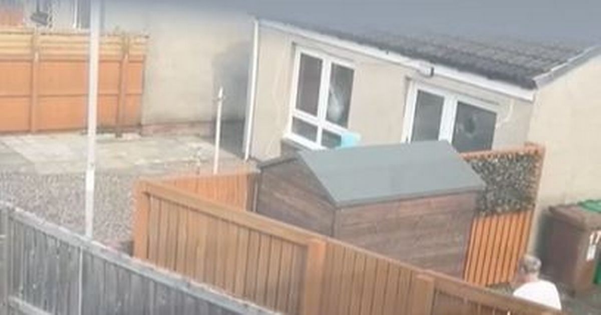 Hooded yob seen launching brick at window of Fife house