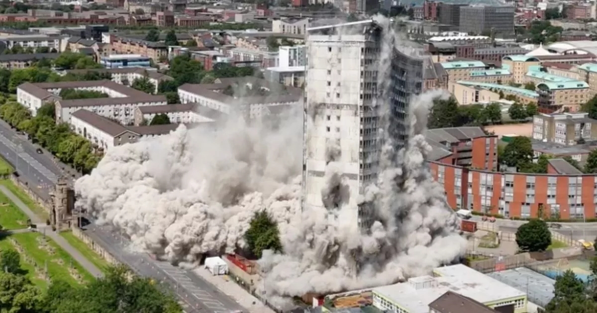 Gorbals tower block collapse in pictures as dust cloud engulfs buildings during demolition
