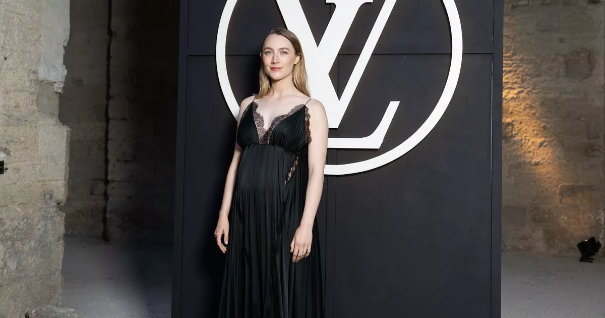 Saoirse Ronan shows off baby bump at Louis Vuitton Women's Cruise Show 2026