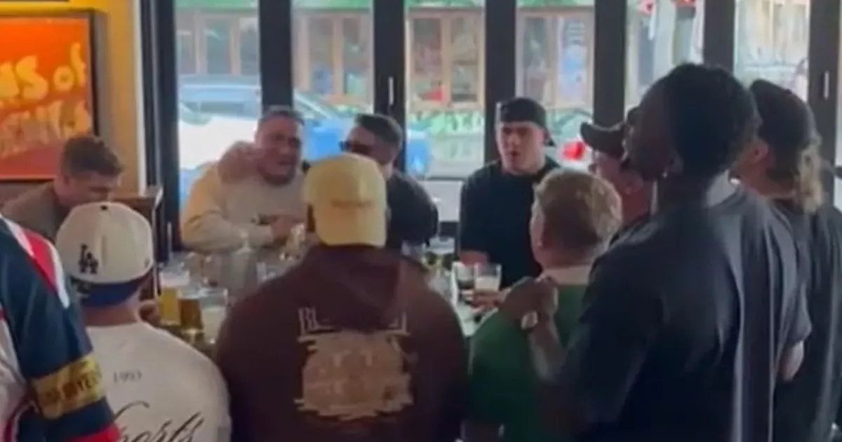 Lions players stun fans with sing-song at Sydney bar