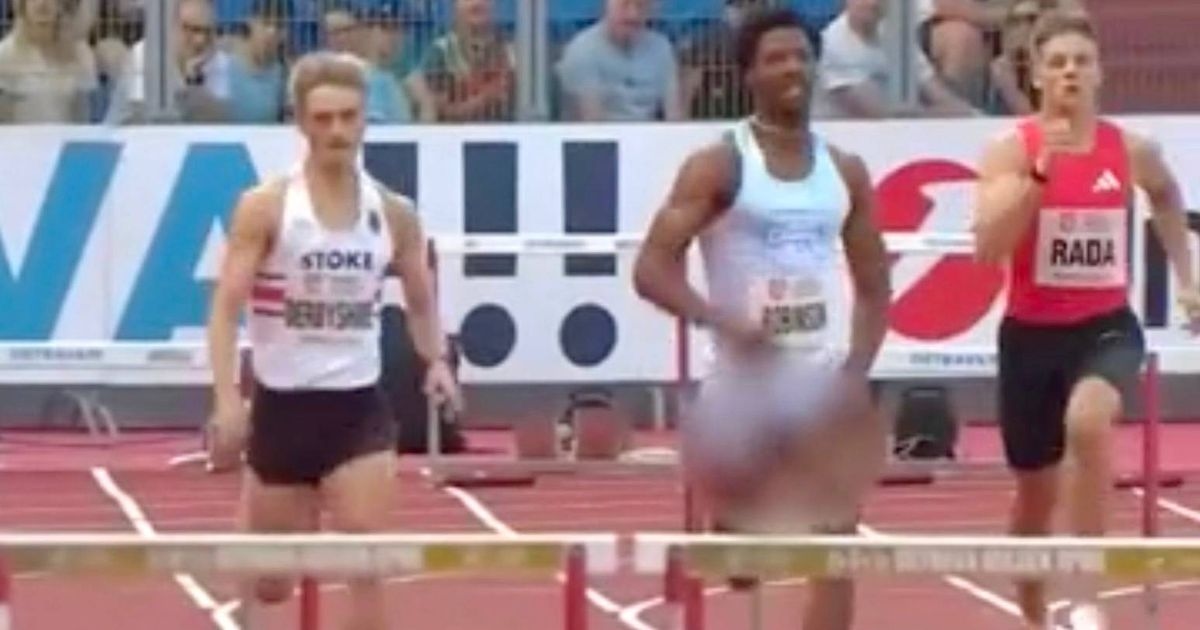 Athlete wins 400m hurdles despite penis falling out of shorts and needing to