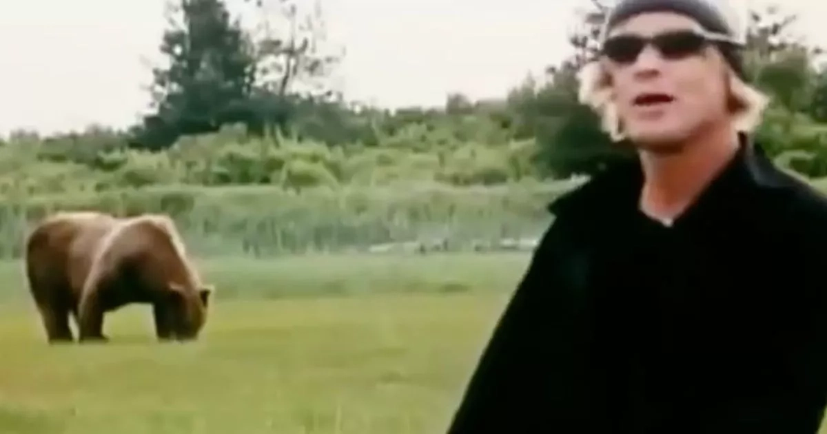 Screaming couple eaten alive by bear and gruesome feast is caught on camera
