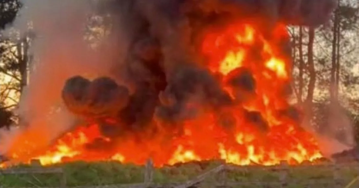 Raging fire blankets RAF airbase in thick smoke as locals warned to 'keep windows closed'