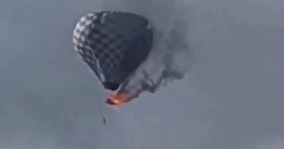Man falls to his death from flaming hot air balloon in horrifying video