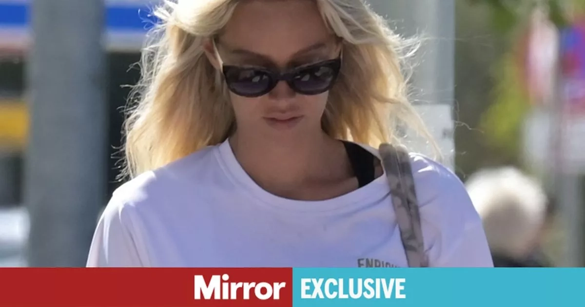 James Argent's girlfriend covers eyes as she's seen for first time since attack