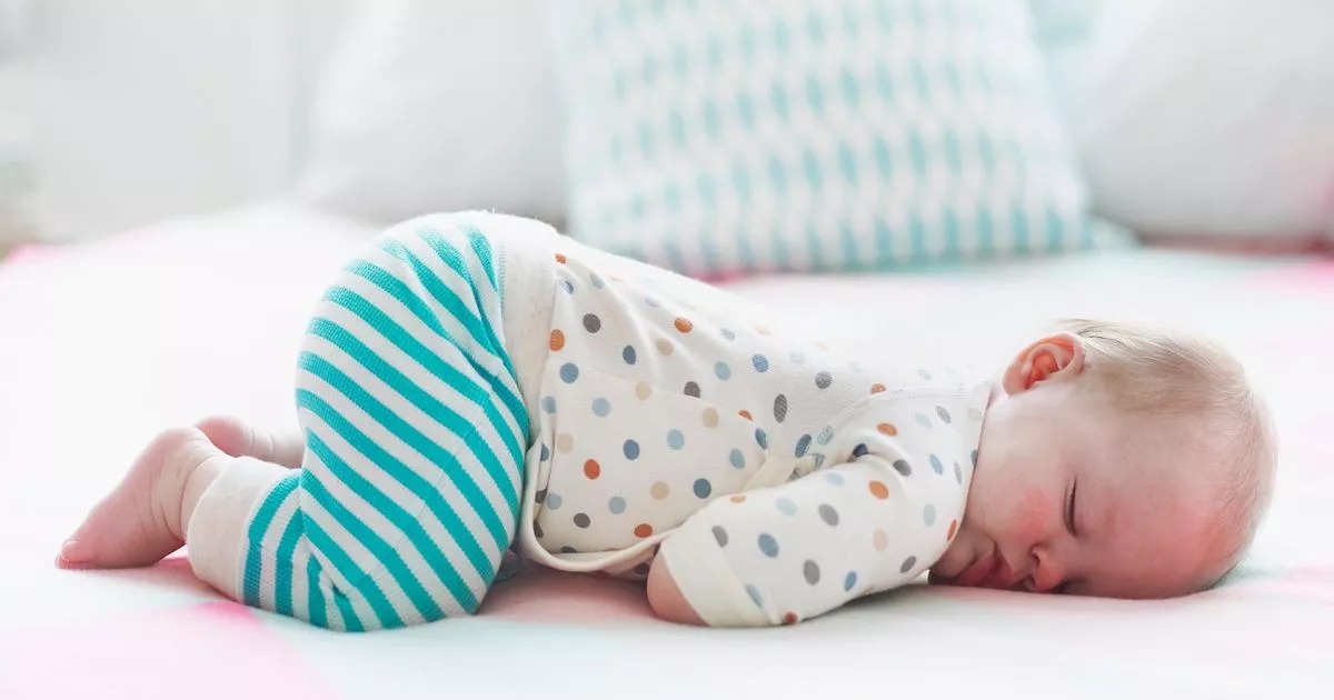 Parents only just learning adorable reason babies sleep with bum in air