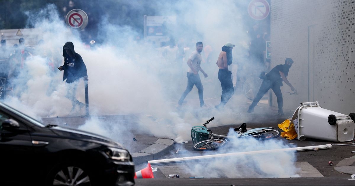 Armed riot police clash with PSG fans in Champions League trophy parade chaos