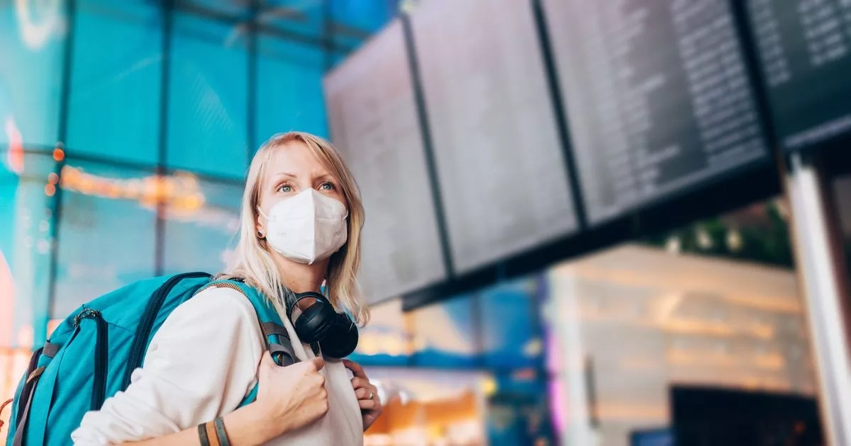 Holidaymakers told to wear masks and get jabs as cases of 'new Covid' soar