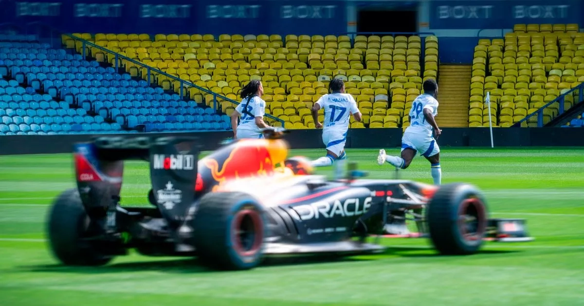 Red Bull star drives F1 car on Premier League pitch in race against footballers