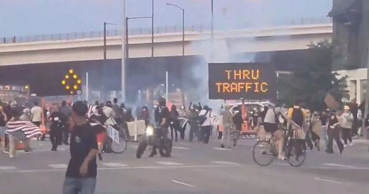 Trump's mass deportations sees riots spread to Denver with crowds tear gassed