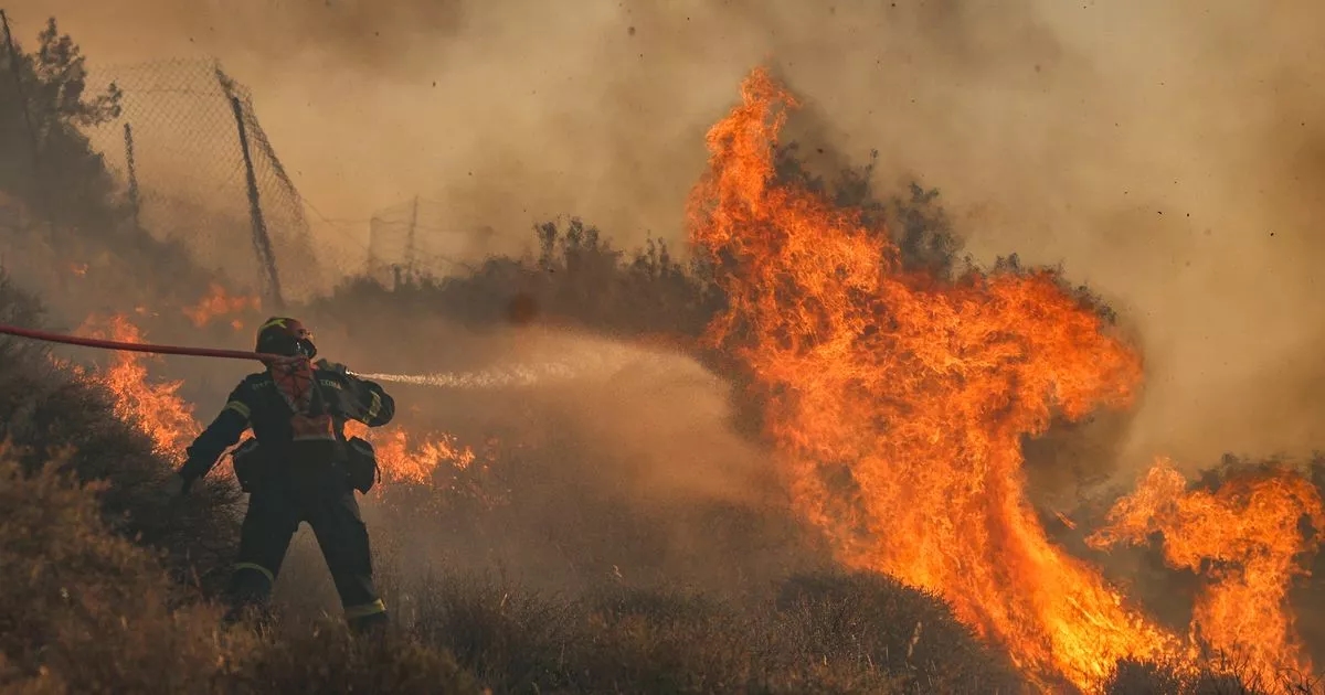Brits travelling to Greece issued emergency alert warning as wildfires spread
