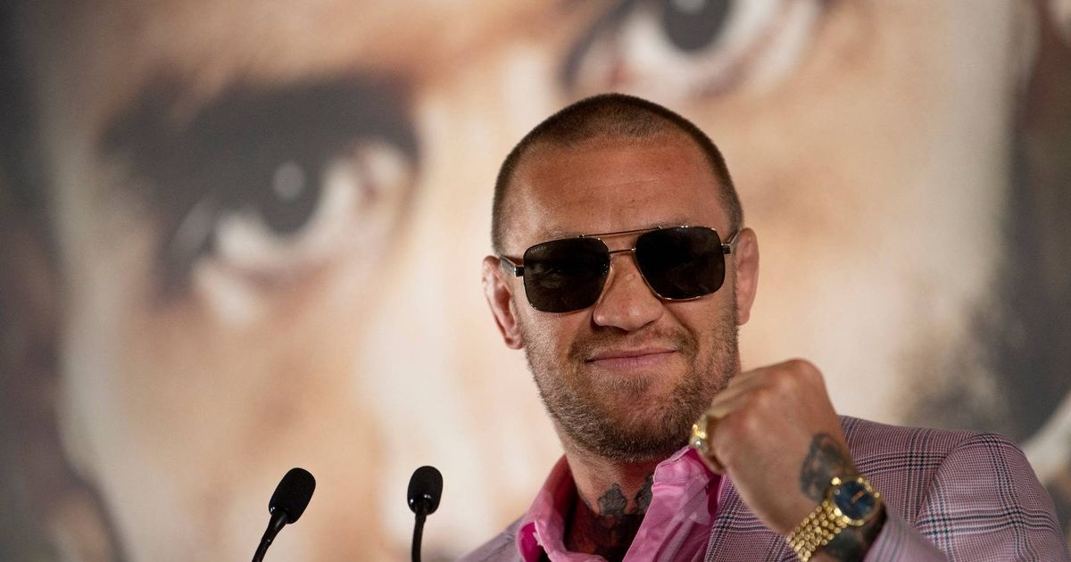 Conor McGregor responds after being seen kissing mystery woman