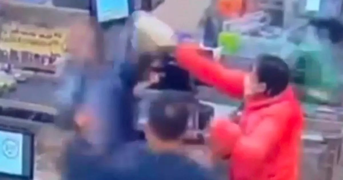 Police officer 'smashes bottle of milk over customer's head' in supermarket CCTV