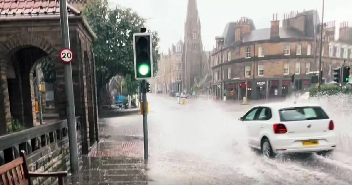 Sudden storm hits major UK city as bus battles through flooded roads