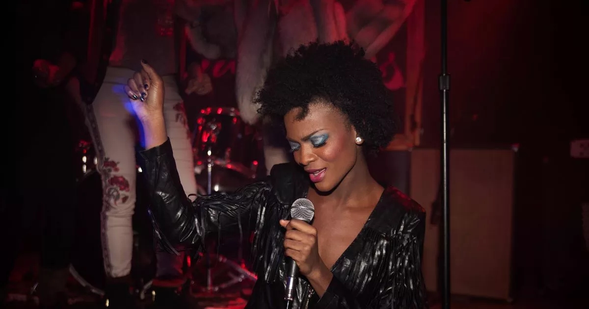 Woman singing in a bar gobsmacked after spotting A-list star standing behind her