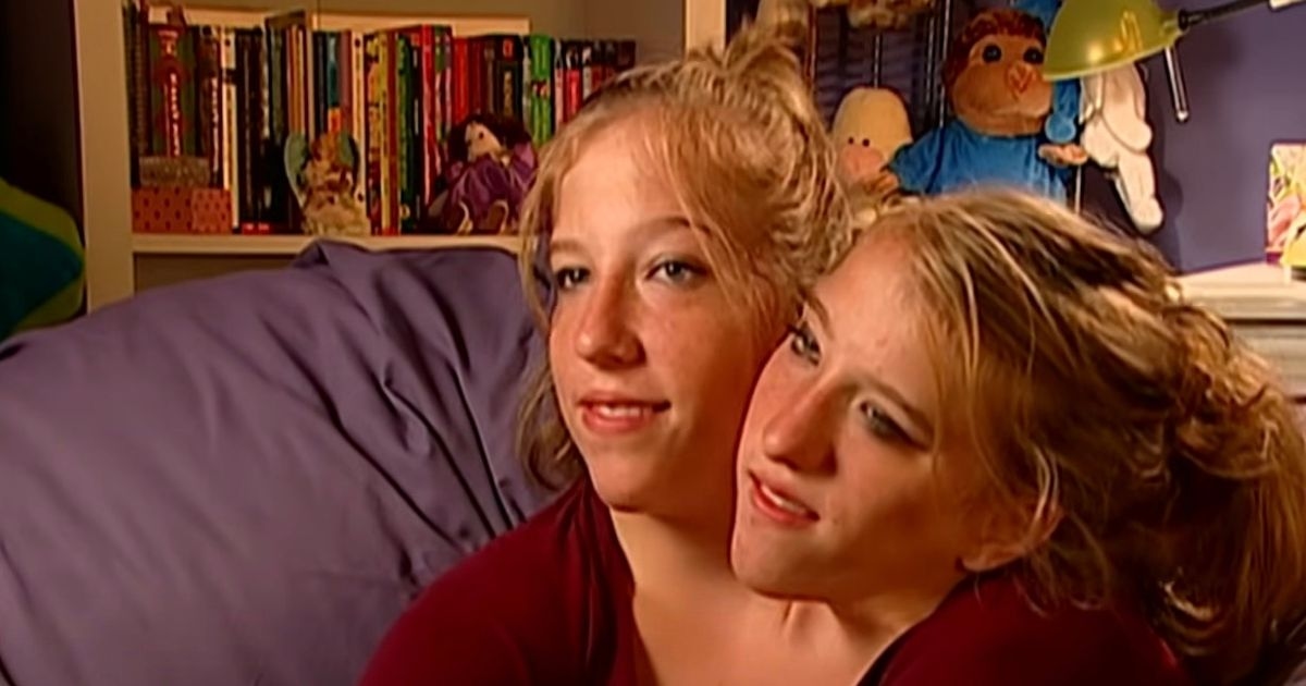 Conjoined twins Abby and Brittany Hensel pictured with newborn baby for first time