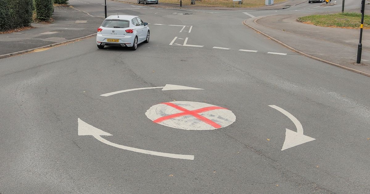 Painted St George's Cross on mini-roundabouts sparks debate among residents
