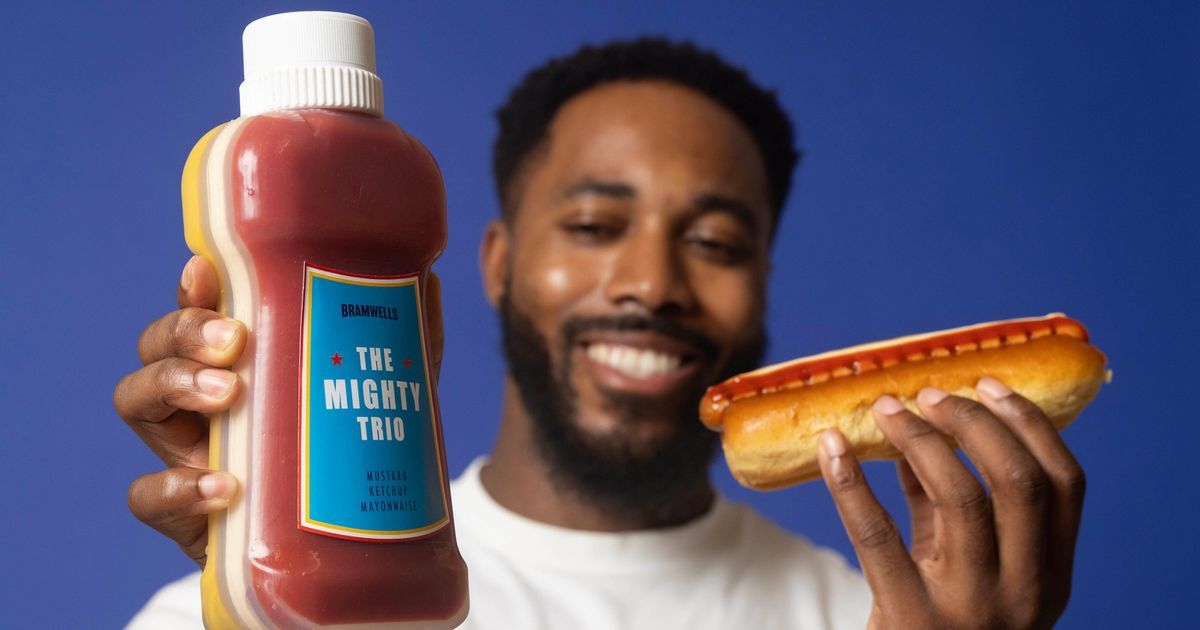 Triple sauce dispenser lets you can squirt ketchup, mayo and mustard in one