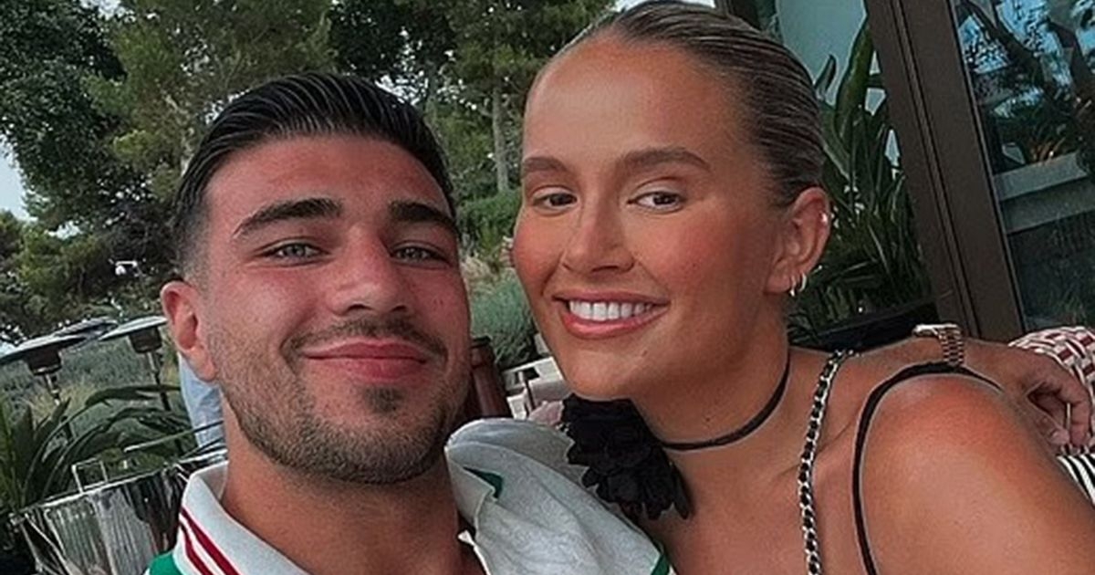 Molly-Mae kisses Tommy Fury as they finally go Instagram official in family snap
