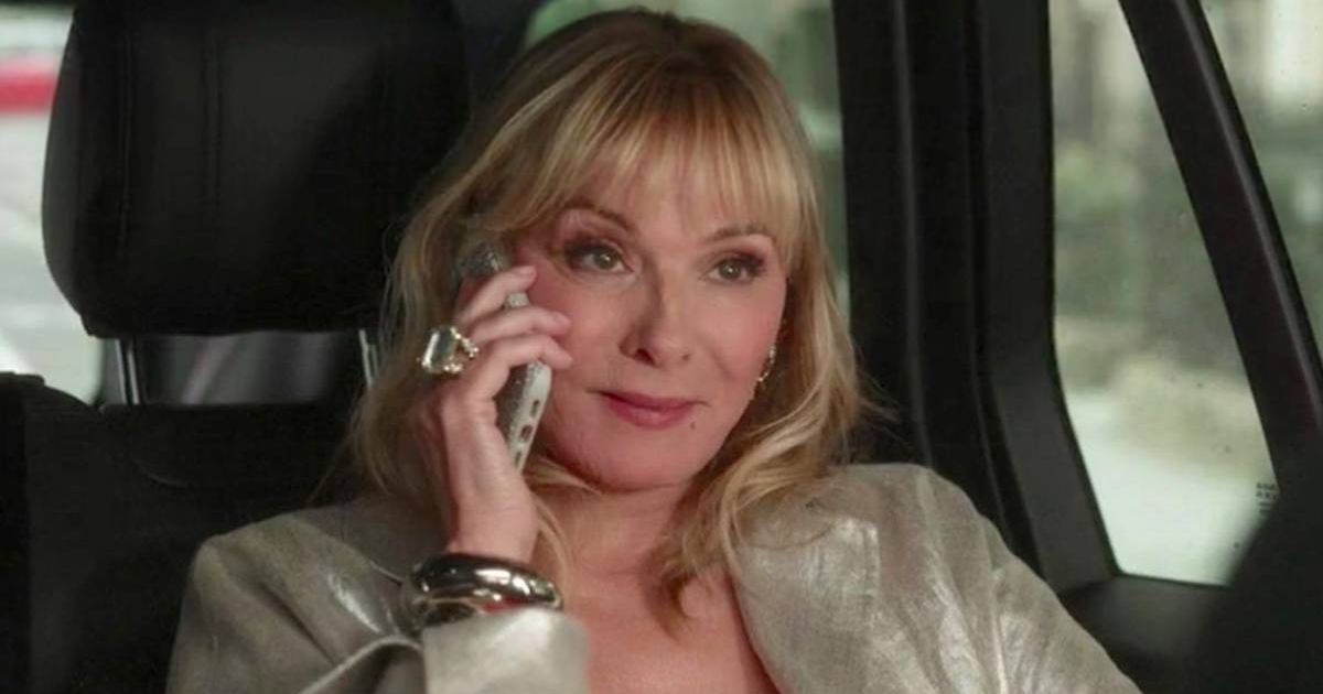 Kim Cattrall has a 'blast' with 'fun playmate' Russell Thomas
