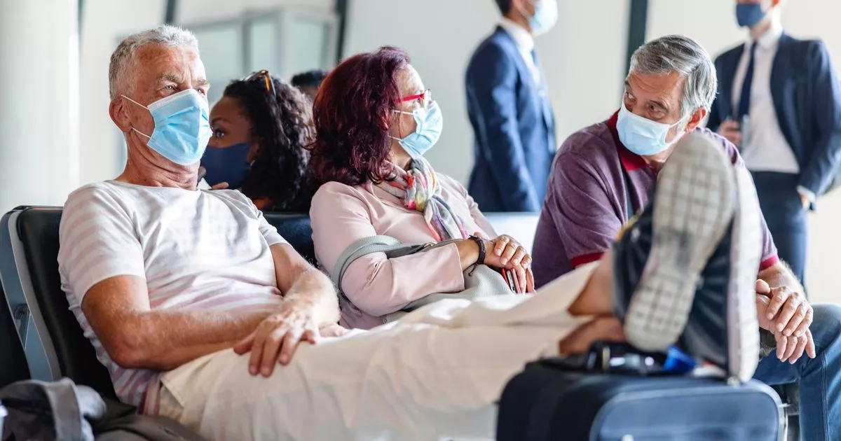 UK holidaymakers urged to wear masks as new Covid variant surges