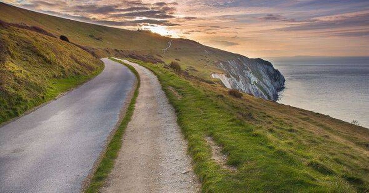 Two die as car plunges off cliff into sea at popular UK beauty spot