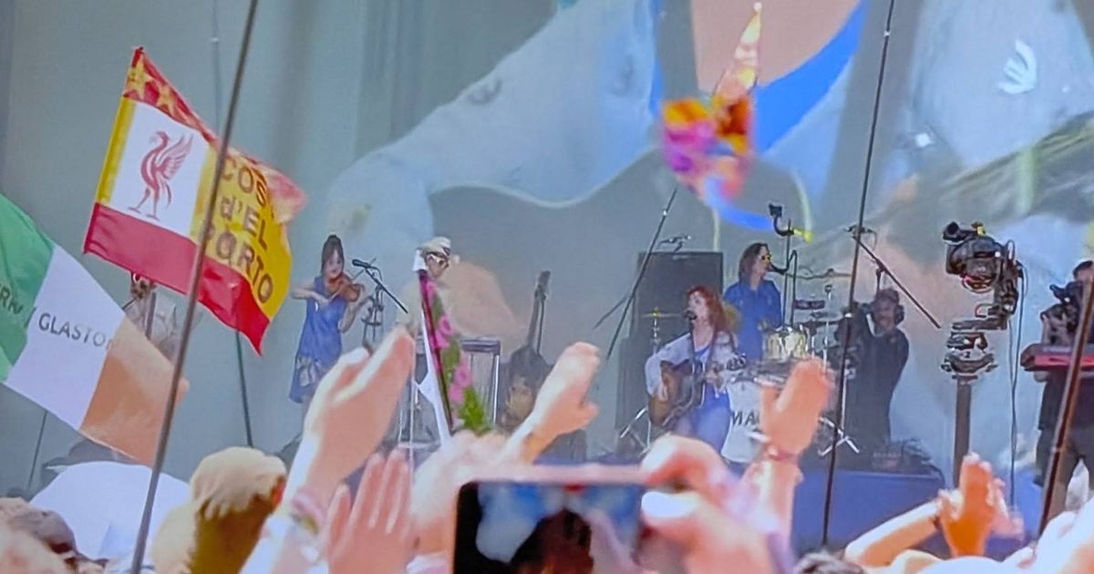 Tragic story behind flag spotted at Glastonbury