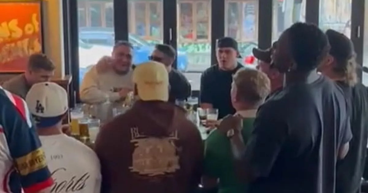Lions squad take over Sydney bar and break into song as stunned fans watch on