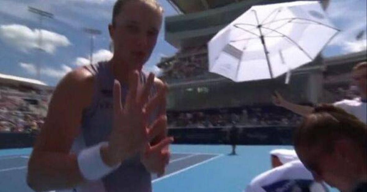 Wimbledon champion tells cameraman to stop filming her as she removes clothes on court