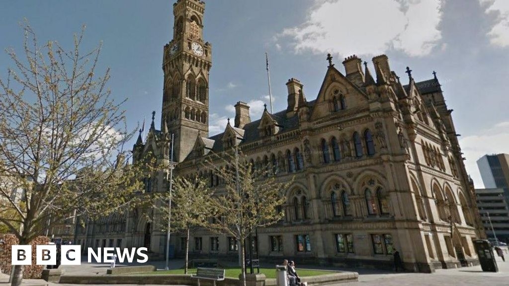 Bradford Council's umbrella-in-ceiling house sells for £83k