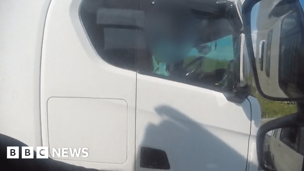 HGV driver caught rolling cigarette while on M5