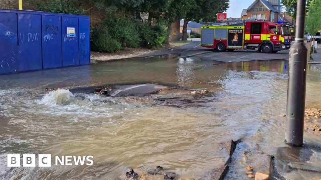Burst pipe in Clapham causes sink hole and travel disruption