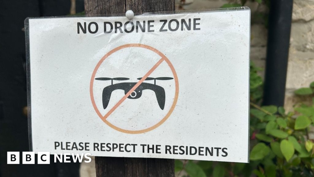 Calls for drones to be banned from village as man filmed in his bath