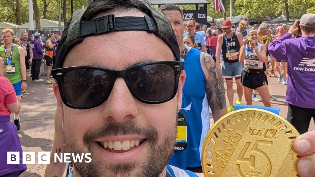 Powys runner raises thousands in marathon after saving life