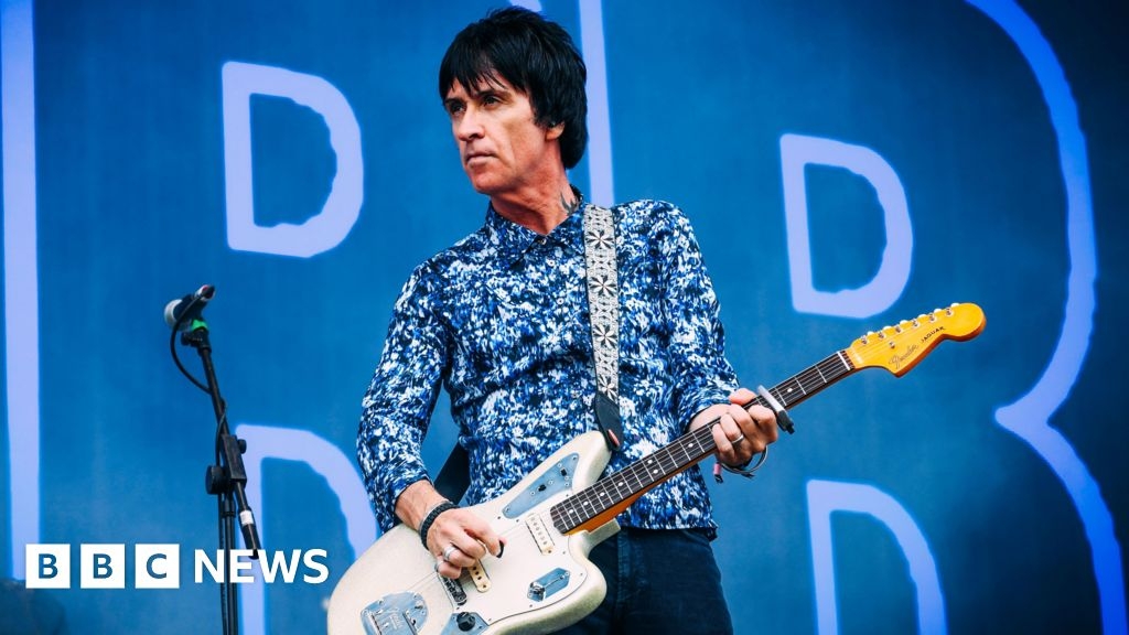 Johnny Marr 'record store legend' plaque unveiled in Manchester