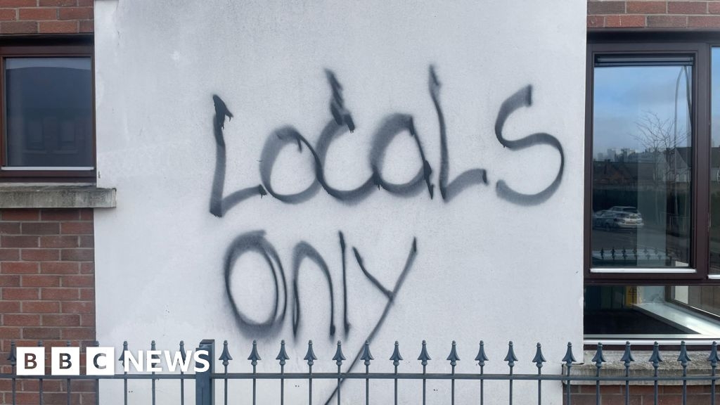 South Belfast: Family 'scared' after racist attack on new home