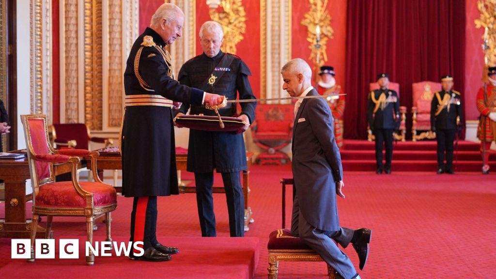 Sir Sadiq Khan formally receives his knighthood from King Charles