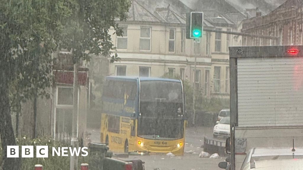 Heavy downpours and flooding shut Devon roads