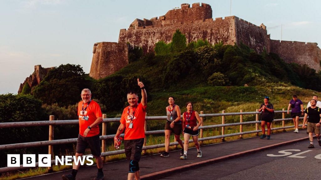 Jersey's Island Walk raises thousands despite hot temperatures