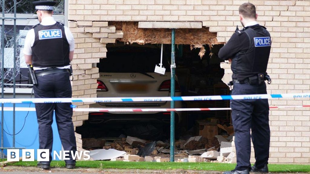 Woman who crashed into school had suffered seizure, court hears