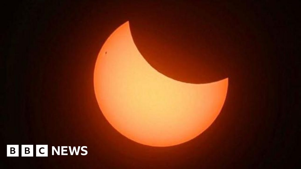 Partial solar eclipse captured across the south of England