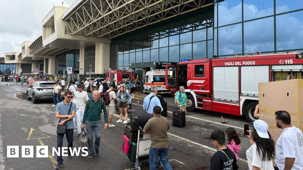 Milan Malpensa airport: Man starts fire and smashes screens with hammer