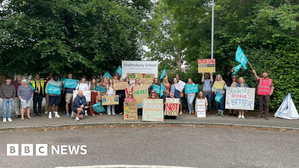 Staff at a Dorset school strike over restructuring plans for two schools