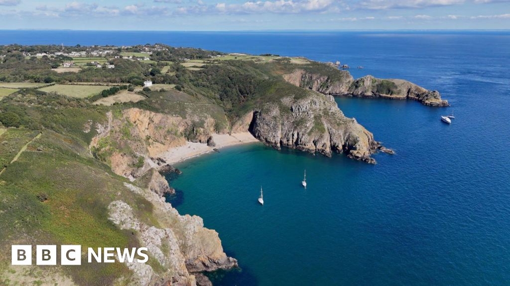 Why was Sark liberated a day after Guernsey?