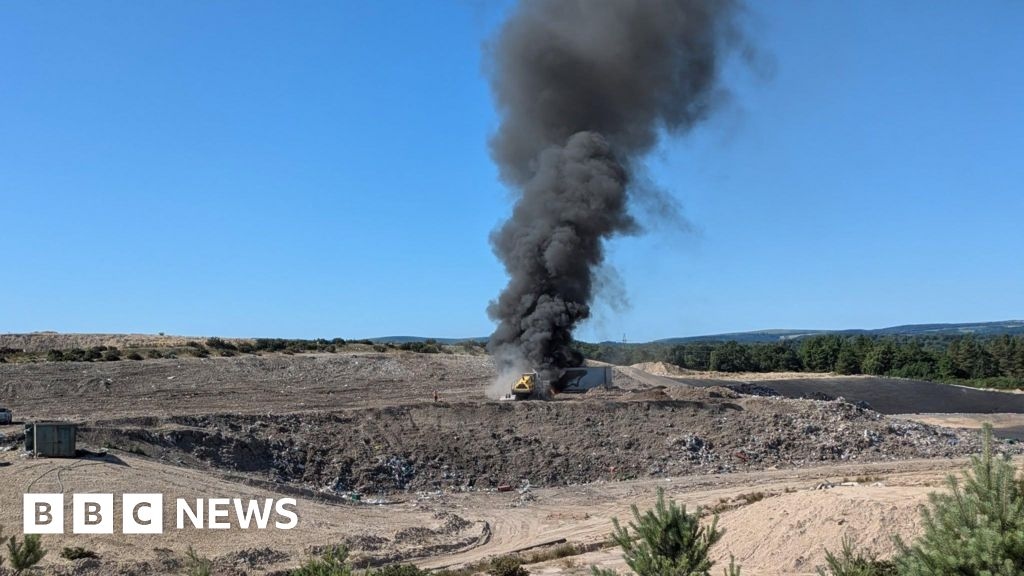 Firefighter pictures show rubbish lorry engulfed in flames