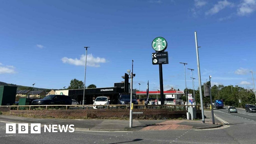 Ilkley Starbucks sign on pole put up without permission
