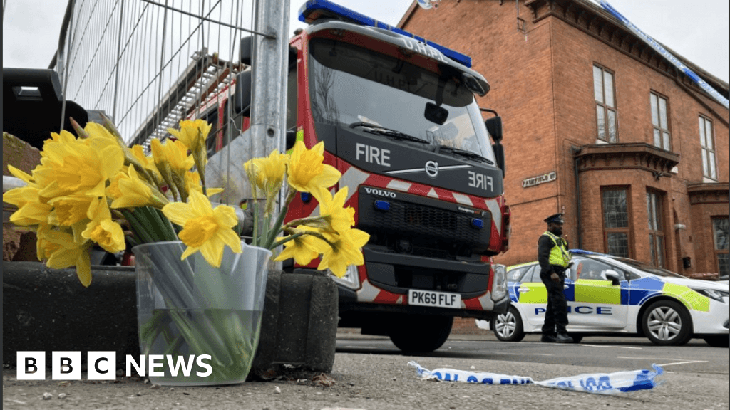 Flowers left for girl, 4, who died after Manchester house fire