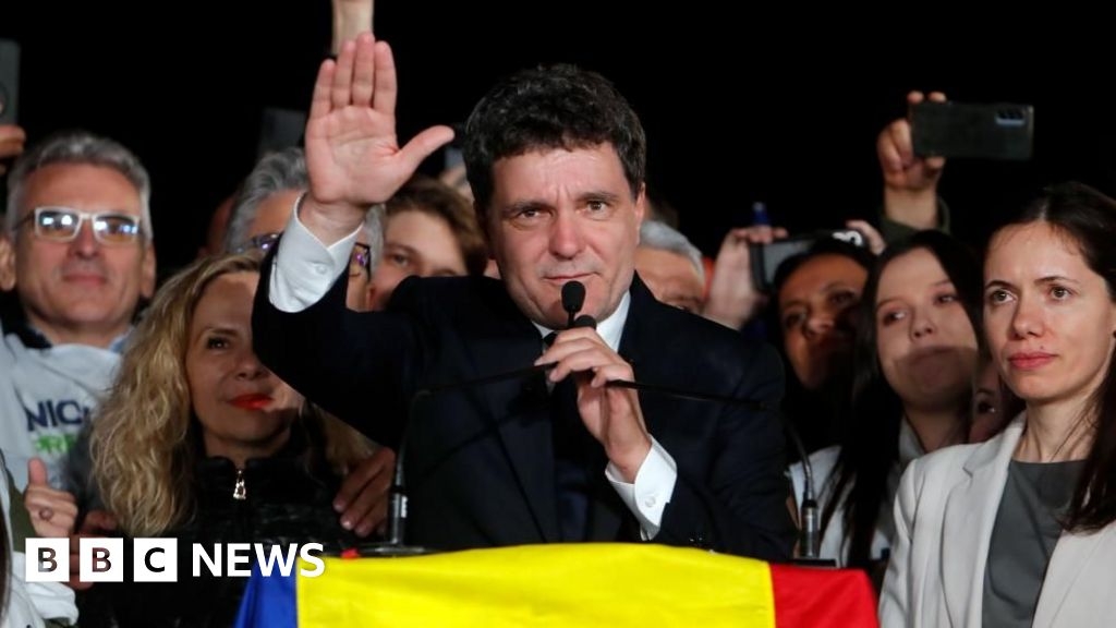 Huge challenges await new president of divided Romania