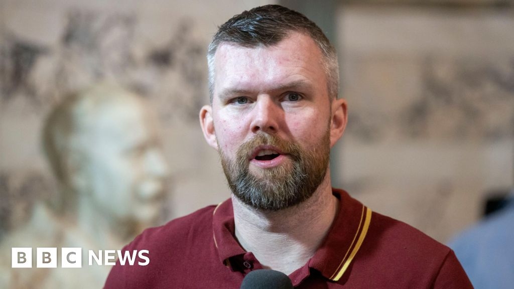 Gerry Carroll: Assembly member condemns 'intimidatory' graffiti