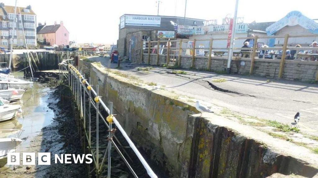 Temporary resin fix for West Bay's crumbling harbour walls